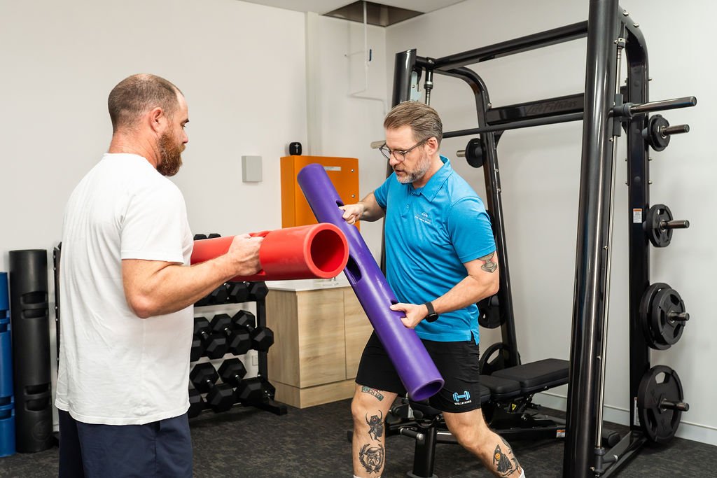Instructor Louis training with a client during a one on one session